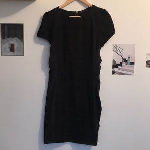Short sleeve black dress with plisse detail